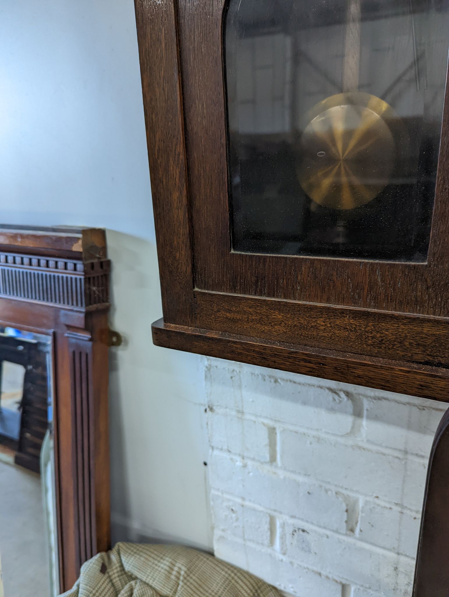 A 1920's oak cased wall clock, height 80cm